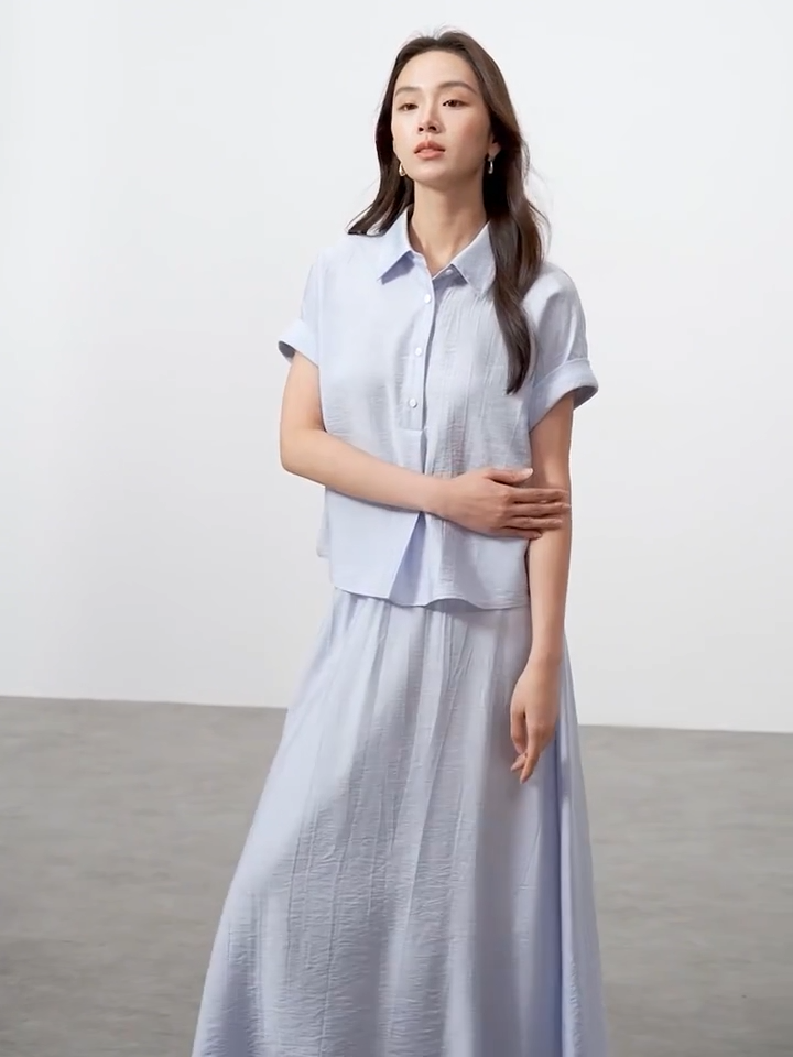Video showcasing a Women's Two-piece kimono set in Forget-me-not Mist color, crinkled viscose, oversized shirt, and flared midi skirt. — From Borcelleclothes.