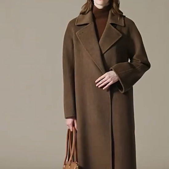 Video showcasing a Women's Long camel hair coat in Gobi Haze color, featuring a pointed collar and princess seams. — From Borcelleclothes.