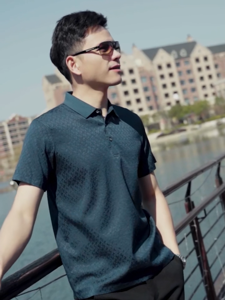 Video showcasing a Men’s Mulberry silk polo in Gulf Blue and Sea Fog colors, with raised diamond jacquard — composed, breathable, and structured for the space between formality and ease. From Borcelleclothes.