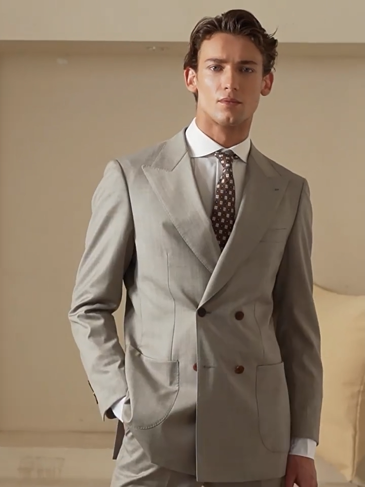 Video showcasing a Men's Vitale Barberis Canonico Super 110s wool suit — double-breasted jacket with side-elastic trousers. Color: Haze of Olive Groves. — From Borcelleclothes.
