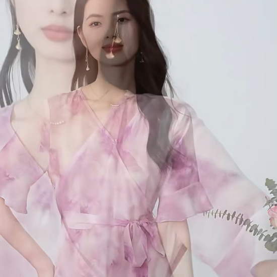 Video showcasing a Women's Mid-calf flared wrap dress in 100% Mulberry silk crepe de Chine in Highland Heather. Features a wrap bodice, flounce cuff sleeves, and wave-curved flounces. — From Borcelleclothes.