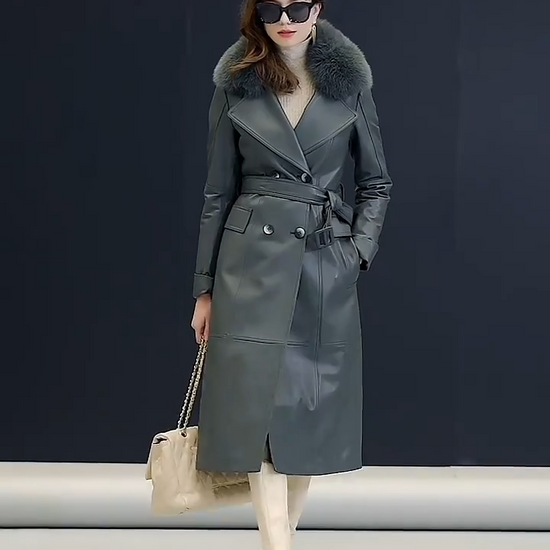 Video showcasing a Women's Mid-calf sheepskin coat in Independence color, with wide notch lapels, detachable tonal fox fur collar, and A-line silhouette — From Borcelleclothes.
