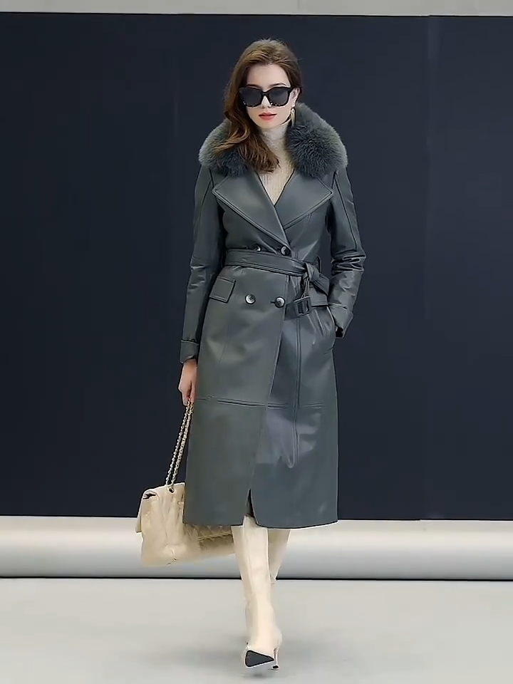 Video showcasing a Women's Mid-calf sheepskin coat in Independence color, with wide notch lapels, detachable tonal fox fur collar, and A-line silhouette — From Borcelleclothes.