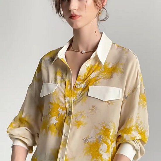   Video showcasing a women's 100% Mulberry Silk Mimosa Print Shirt. From Borcelleclothes.