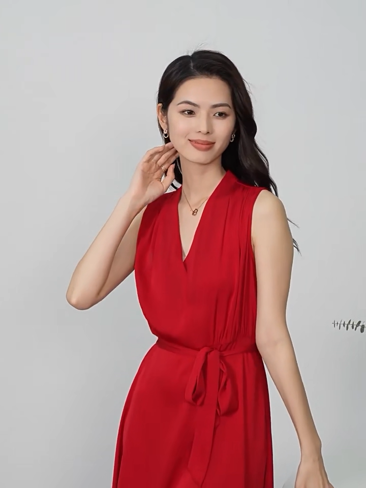 Video showcasing a Women's sleeveless flared midi dress in Monte Carlo and Win of Taste colors, crafted from 19-momme Mulberry silk double georgette, featuring a fixed wrap bodice, sculptural draping at the waist, and a continuous-cut collar. — From Borcelleclothes.