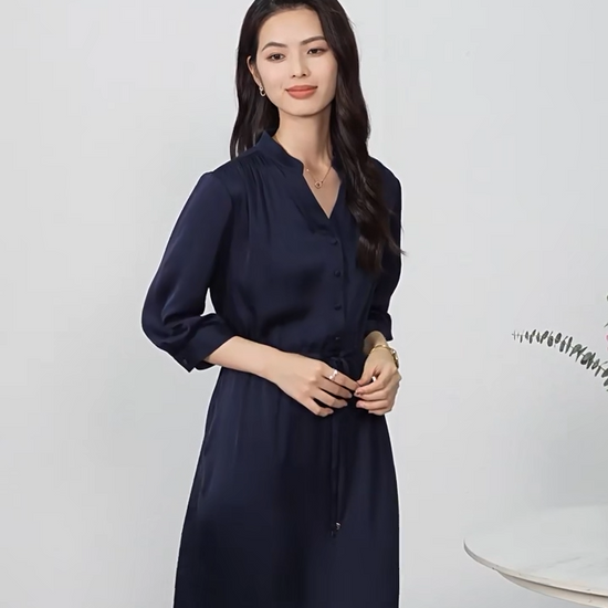 Video showcasing a double georgette silk dress in Monticola Solitarius and Behind the Clods colors, with a curved high-low hem, stand-up collar, and drawstring waist creating fluid drapes. — From Borcelleclothes.