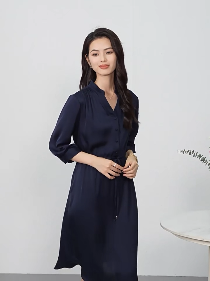 Video showcasing a double georgette silk dress in Monticola Solitarius and Behind the Clods colors, with a curved high-low hem, stand-up collar, and drawstring waist creating fluid drapes. — From Borcelleclothes.