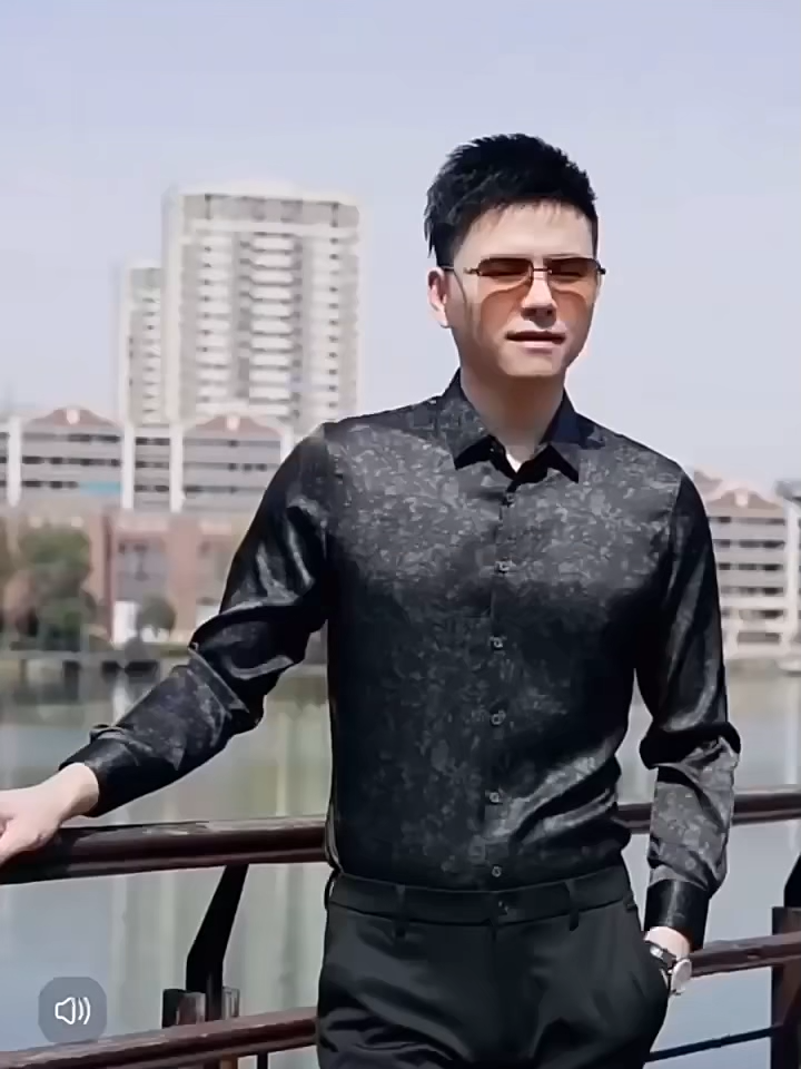 Video showcasing a men’s Mulberry silk shirt with 9.2% elastane in Noctis Labyrinthus print, featuring a pointed collar and single-button cuffs. — From Borcelleclothes.