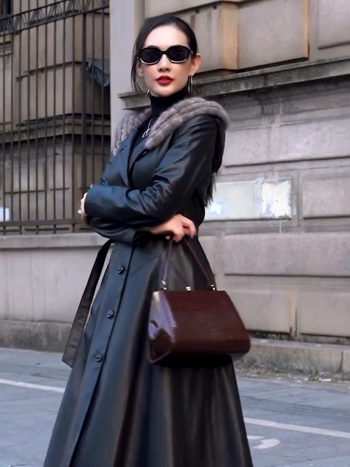 Video showcasing a Women's Flared Hooded Coat in Onyx with two options - Mid-Calf and Seven-Eighths Length. From Borcelleclothes.