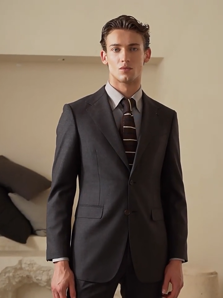 Video showcasing a Men's VBC Super 110s merino wool flannel suit in Portofino. Features half-canvas tailoring, barchetta pocket, and Bemberg cupro lining. — From Borcelleclothes.