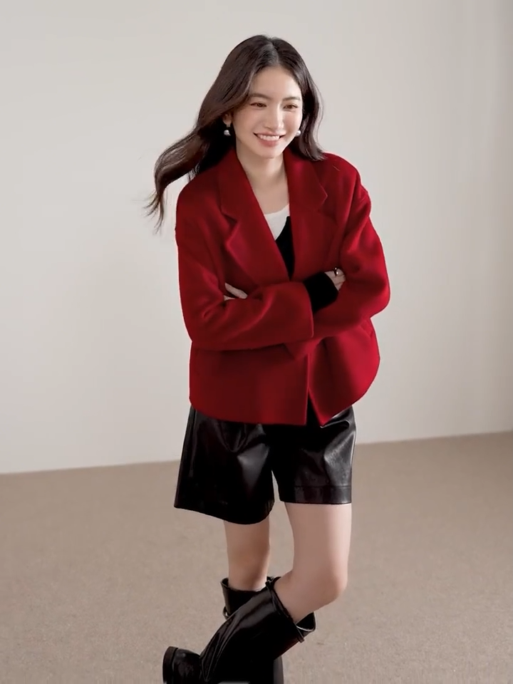 Video showcasing a Women's cropped double-breasted 100% virgin wool jacket in Sweet Rebellion shade, featuring notch lapels and hand-finished double-faced construction. — From Borcelleclothes.