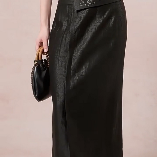 Video showcasing a Women's midi 6A Mulberry silk skirt featuring a distinct craquelure pattern and architectural asymmetry. — From Borcelleclothes.