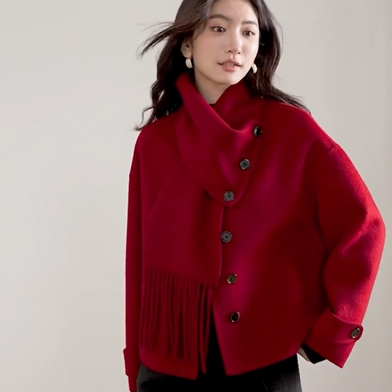 Video showcasing a Women's Short double-sided wool jacket in Tongues of Fire color, with asymmetric buttons and a matching detachable scarf — From Borcelleclothes.