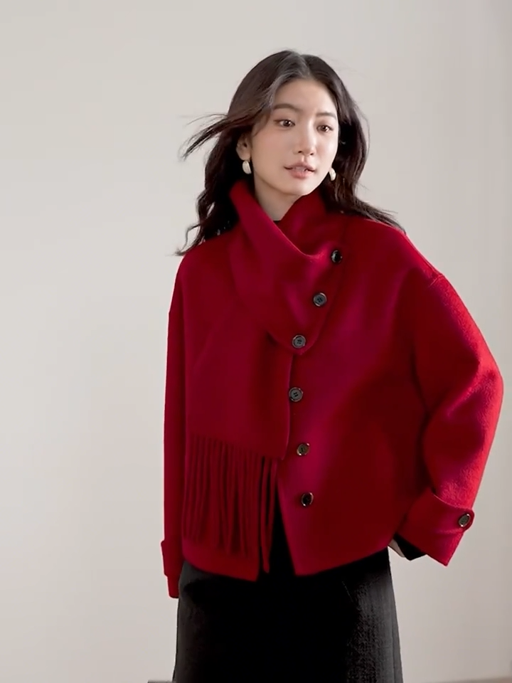 Video showcasing a Women's Short double-sided wool jacket in Tongues of Fire color, with asymmetric buttons and a matching detachable scarf — From Borcelleclothes.
