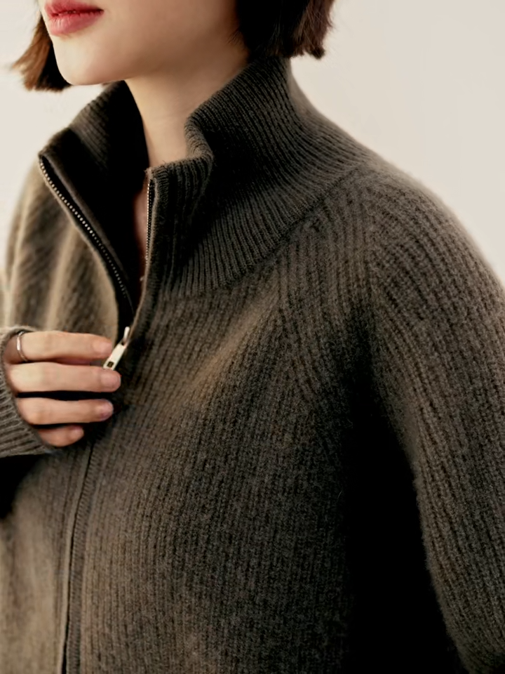 Video showcasing a Women’s English rib cashmere cardigan in Vanilla and Umber, with zip front and raglan sleeves — From Borcelleclothes.
