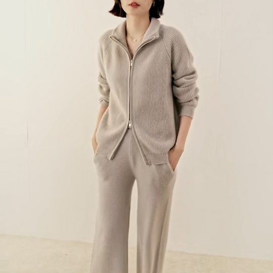 Video showcasing a Women’s English rib cashmere cardigan in Vanilla and Umber, with zip front and raglan sleeves — From Borcelleclothes.