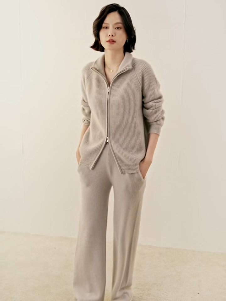 Video showcasing a Women’s English rib cashmere cardigan in Vanilla and Umber, with zip front and raglan sleeves — From Borcelleclothes.