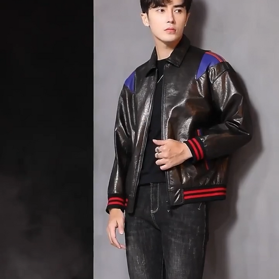 Video showcasing a Men’s sheepskin jacket in Wenge (near-black brown) with Iris shoulder insert and twin Scarlet edging; pointed collar, zip-front, rib-knit cuffs and hem, double-welt pockets. — From Borcelleclothes.