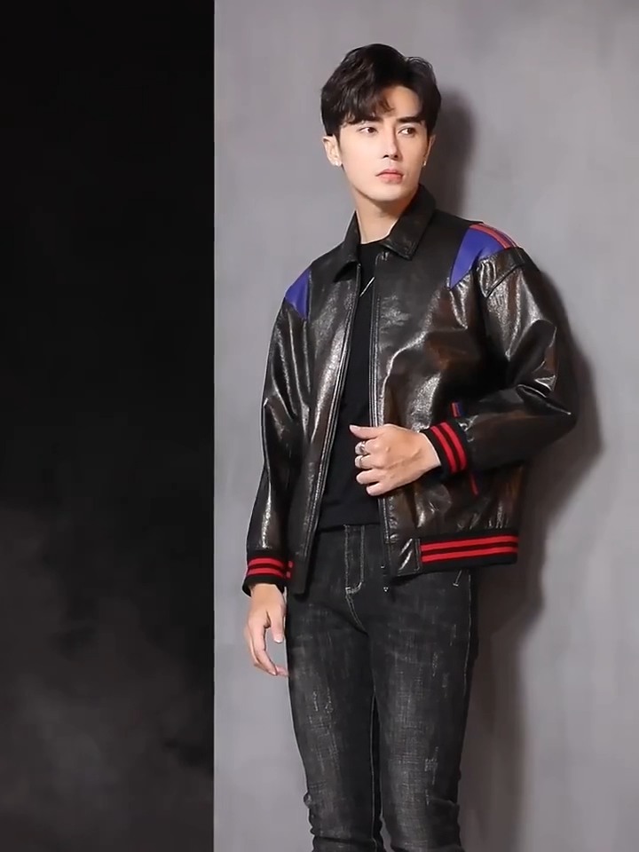 Video showcasing a Men’s sheepskin jacket in Wenge (near-black brown) with Iris shoulder insert and twin Scarlet edging; pointed collar, zip-front, rib-knit cuffs and hem, double-welt pockets. — From Borcelleclothes.