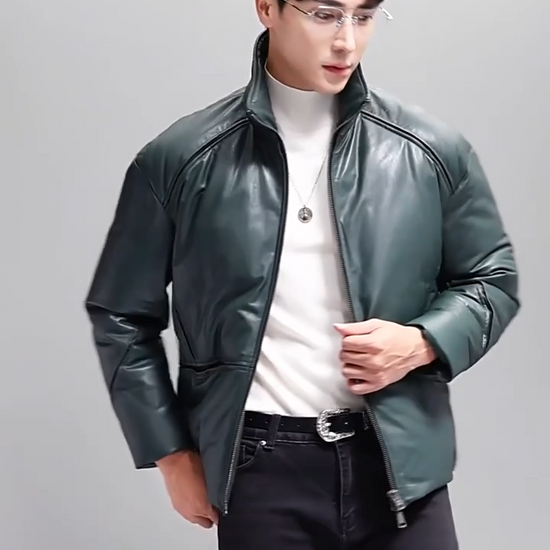 Video showcasing a Men’s sheepskin down jacket with sculpted seams revealing contrast inserts — shown in Winter Balsam. —From Borcelleclothes.