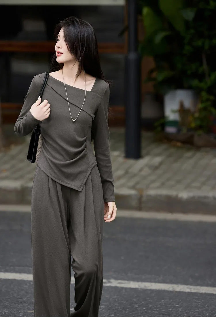 Woman walking forward and looking to the side in an Unknown Wanted ribbed set — From Borcelleclothes.