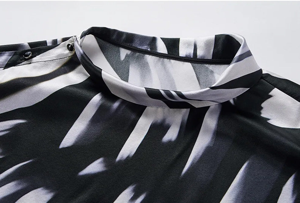 Close-up of asymmetric rounded fold-over collar on Fleeting Impulse silk blouse — From Borcelleclothes.