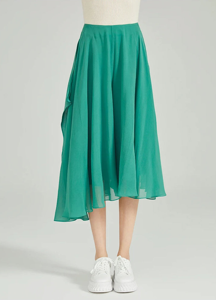 Front view of women's asymmetrical draped Mulberry silk trousers in Meringue green — From Borcelleclothes.