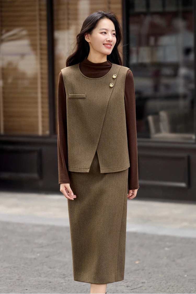 Relaxed look of the asymmetrical vest without a belt, showing the natural drape of the wool twill — From Borcelleclothes.