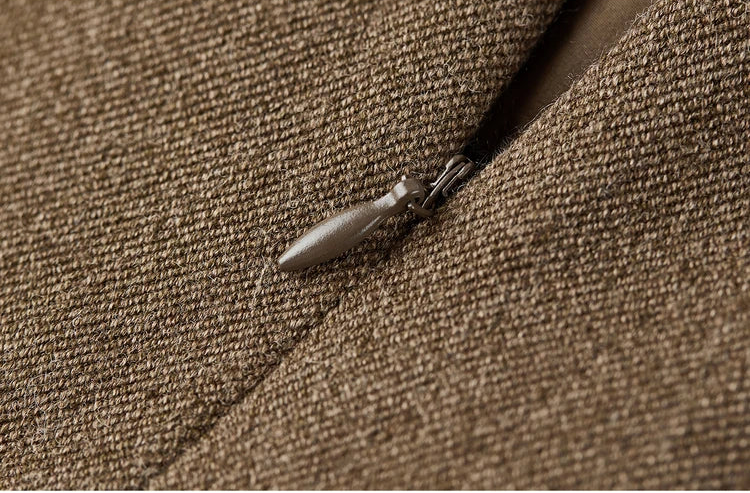 Close-up of the side invisible zipper on the wool blend midi skirt for a seamless finish — From Borcelleclothes.