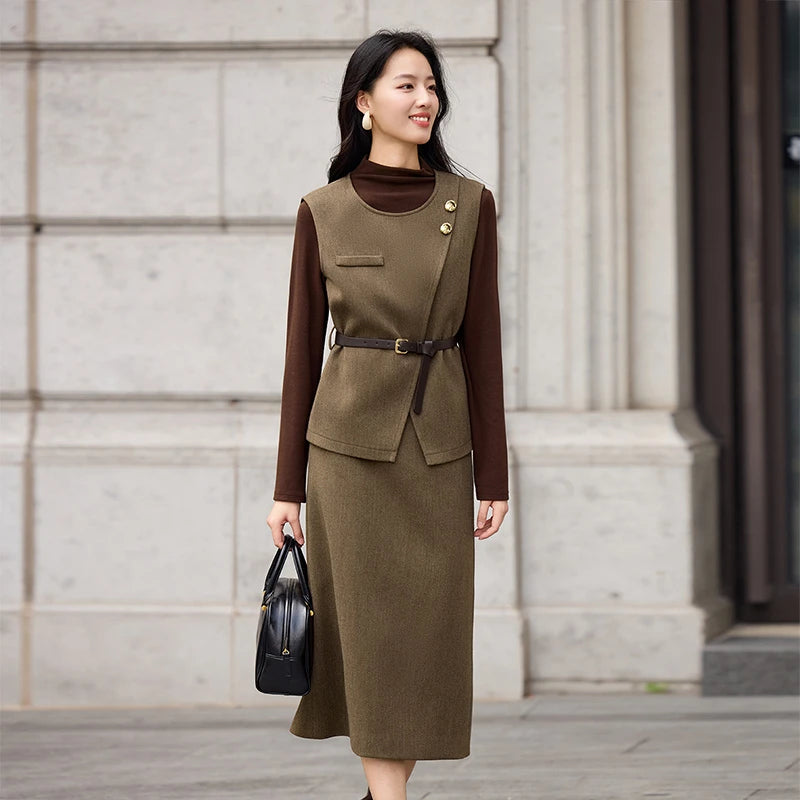 Asymmetrical olive-brown wool blend vest, decorative molten gold buttons, slender leather belt, strict midi skirt with back vent, tailored feminine set in Meet me in Istanbul color. — From Borcelleclothes.