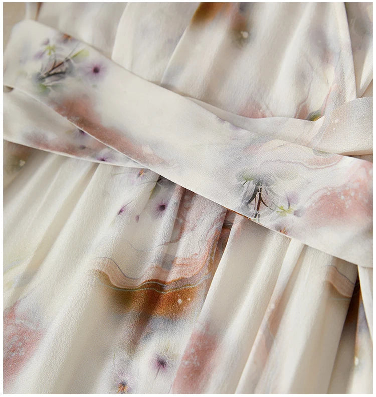 Detail shot of the long sashes crossed over the woman's waist, creating a supportive, protective, and defining silhouette — From Borcelleclothes.