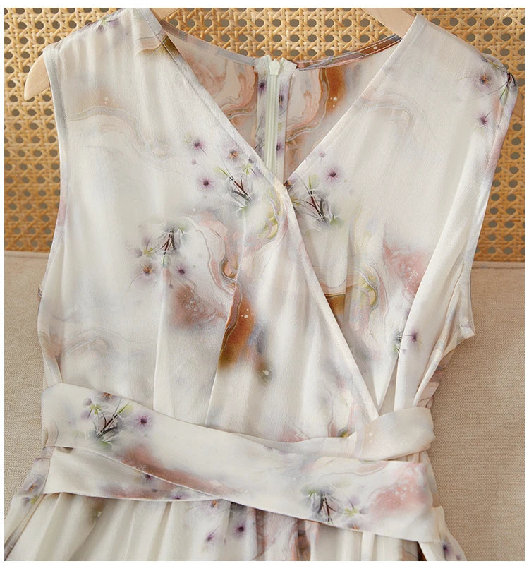 The upper section of the sleeveless silk dress, highlighting the double pleats on the front panels that drape gently over the bust — From Borcelleclothes.