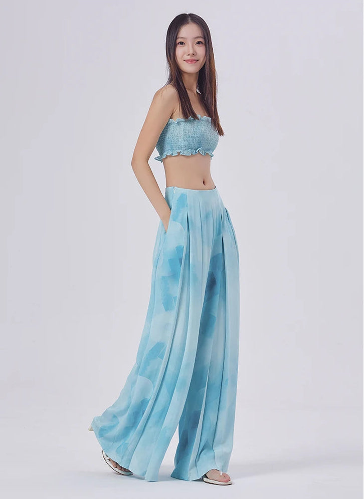 Women's floor-length wide trousers crafted from 30 Momme 6A Grade Mulberry silk in Uyuni Mirage, featuring four front box pleats and an adaptive elasticated back waist. — From Borcelleclothes.