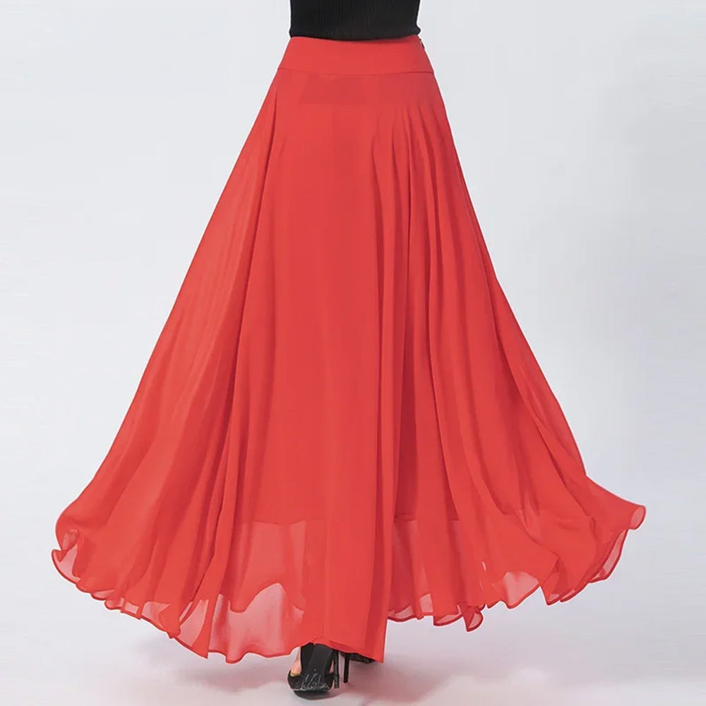 Back view of a model in the Wild Blush silk georgette maxi skirt, highlighting its elegant, long silhouette — From Borcelleclothes.