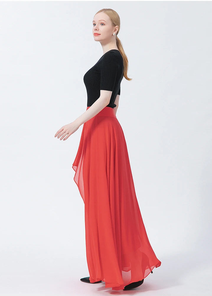 Side view of a model wearing the high-waisted Wild Blush silk maxi skirt with a cascade panel — From Borcelleclothes.