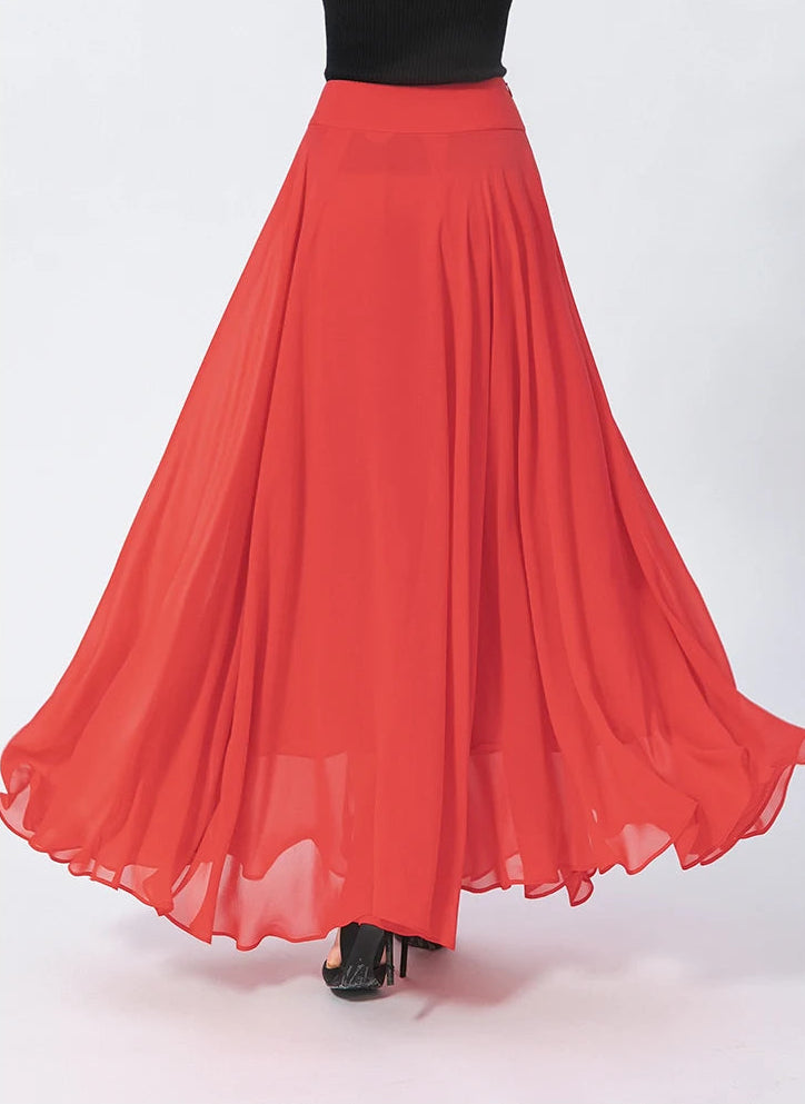 Back view of a model swirling, showcasing the beautiful, airy motion of the double-layer Mulberry silk skirt — From Borcelleclothes.
