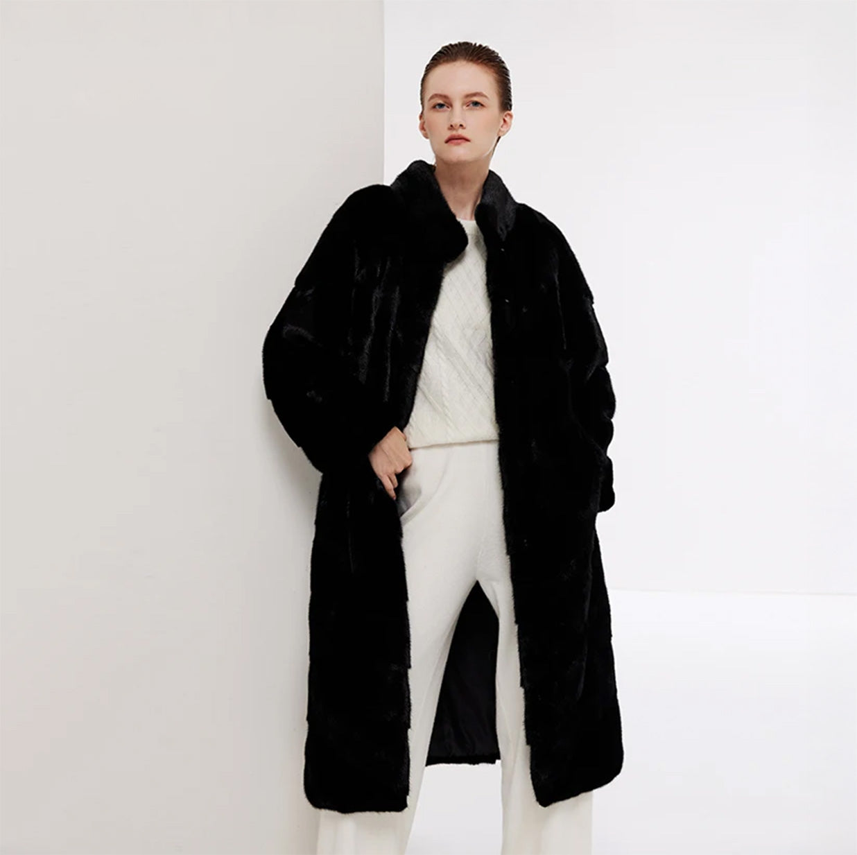 Women’s mid-calf sheared mink coat with diagonal chevron paneling, stand collar, hidden hooks, and internal drawstring waist — Beyond Black color. — From Borcelleclothes.