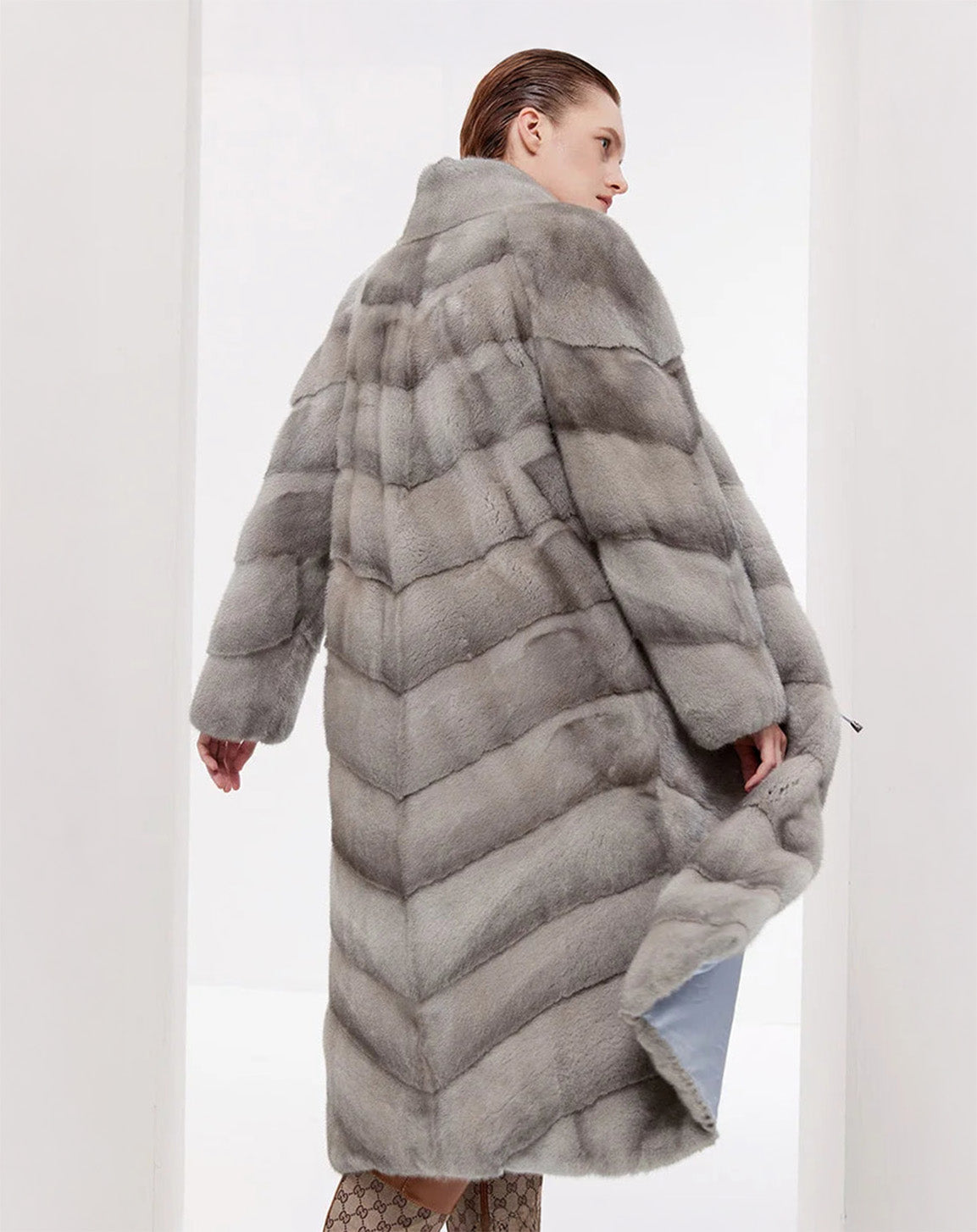 Back view of the women’s chevron sheared mink coat in Call of the Loon — From Borcelleclothes.