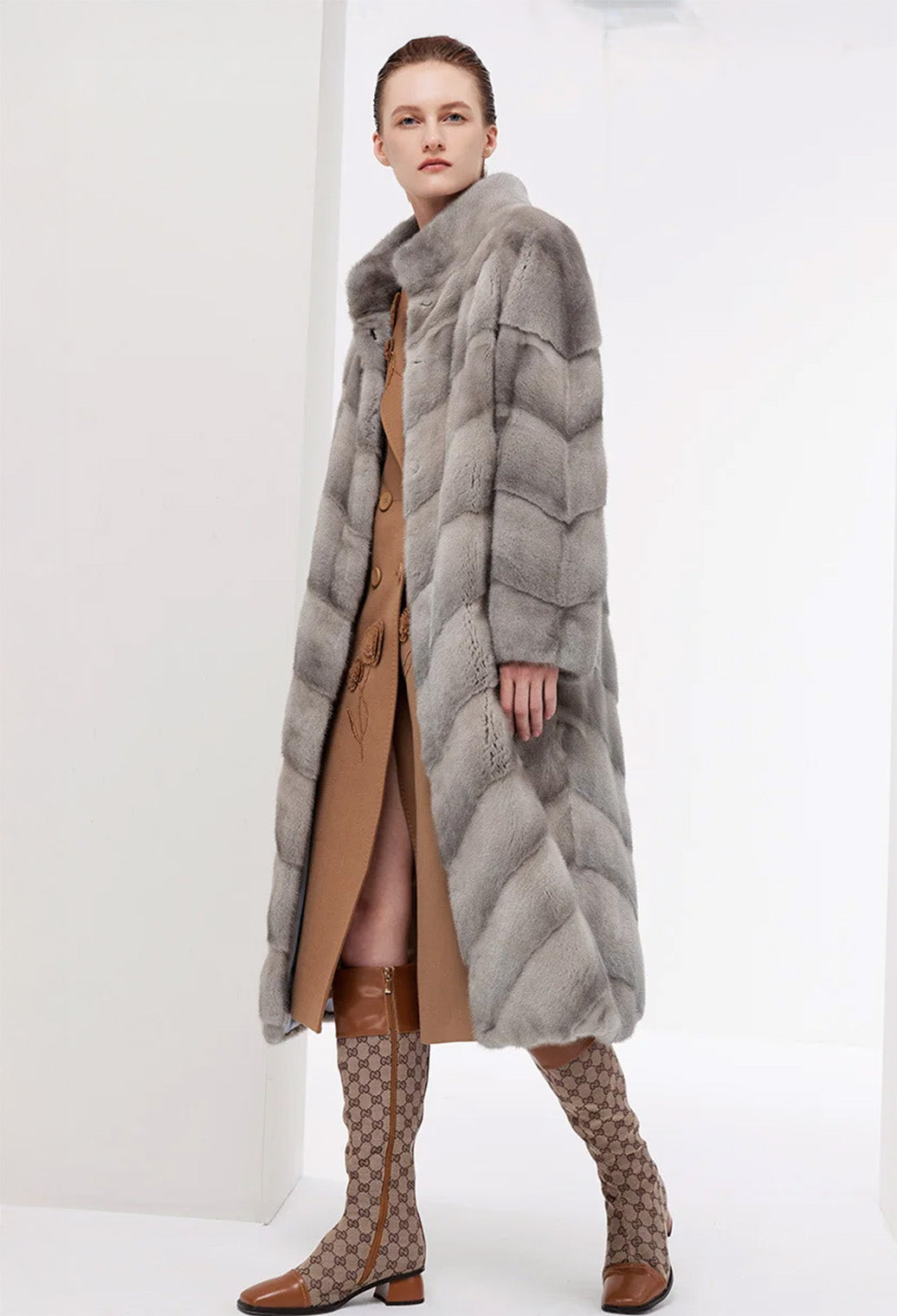 Women’s chevron sheared mink coat in Call of the Loon, model walking sideways — From Borcelleclothes.