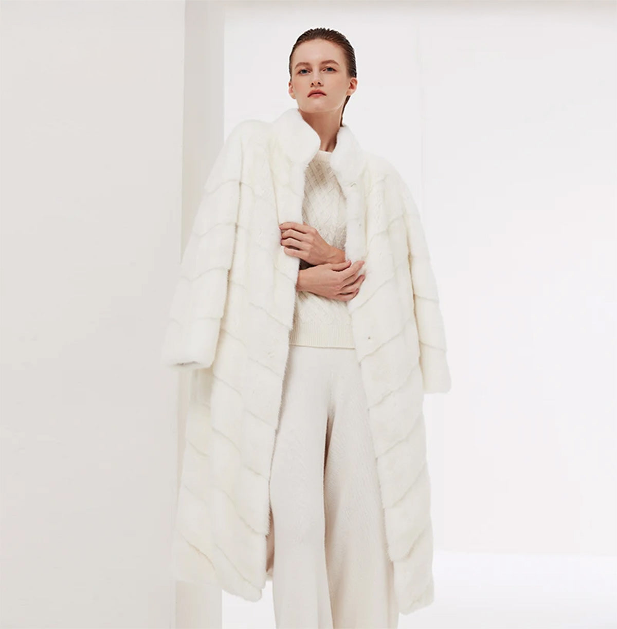 Women’s mid-calf sheared mink coat with diagonal chevron paneling, stand collar, hidden hooks, and internal drawstring waist — Calm color. — From Borcelleclothes.