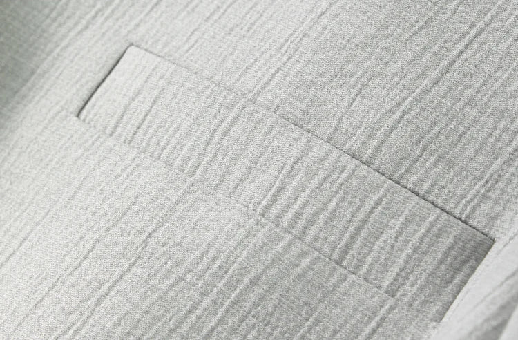 Close-up of the single-welt chest pocket on the Named by Frost cropped jacket. From Borcelleclothes.