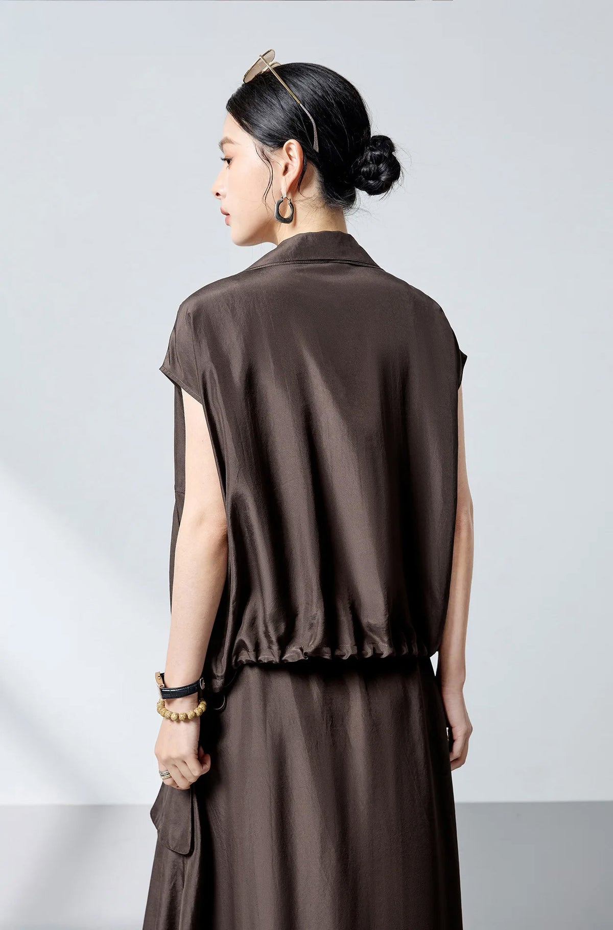 Back view of fluid Mulberry silk blouson in Bitter Chocolate — From Borcelleclothes.
