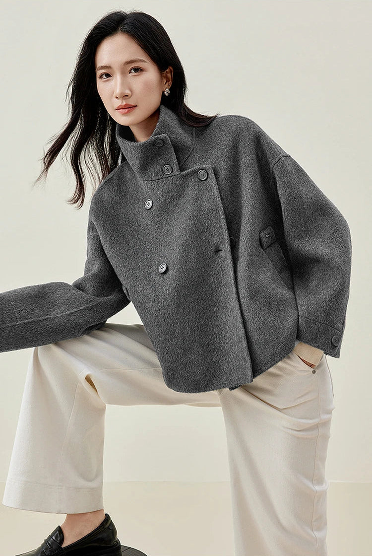 A casual yet sophisticated posture, showing the fluidity of the wool as it moves with the woman. — From Borcelleclothes.