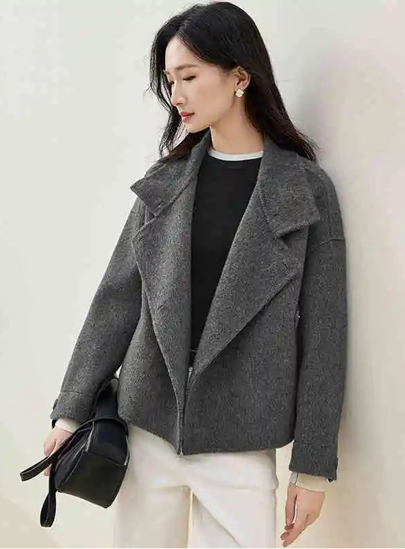 Captured in a transition, the grey shade blurring the boundaries between comfort and mystery. — From Borcelleclothes.