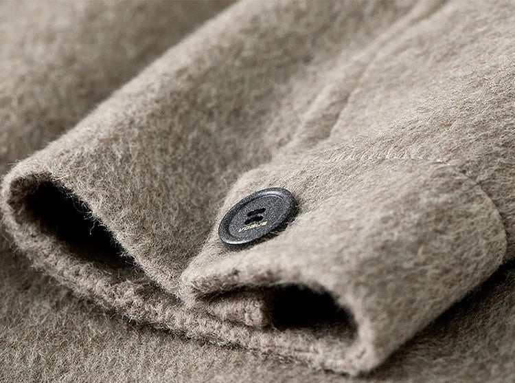 Detailed view of the precisely finished cuff, reflecting the hand-finished craftsmanship of Borcelle. — From Borcelleclothes.