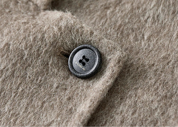 Detail of the top button, the starting point of the Resonance surge in the 980g wool. — From Borcelleclothes.