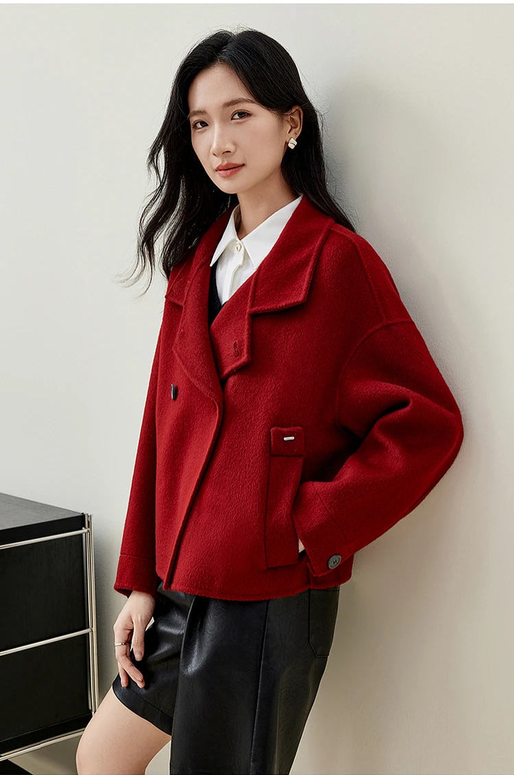 A striking image of the vibrant red wool "activating" the space around the woman. — From Borcelleclothes.