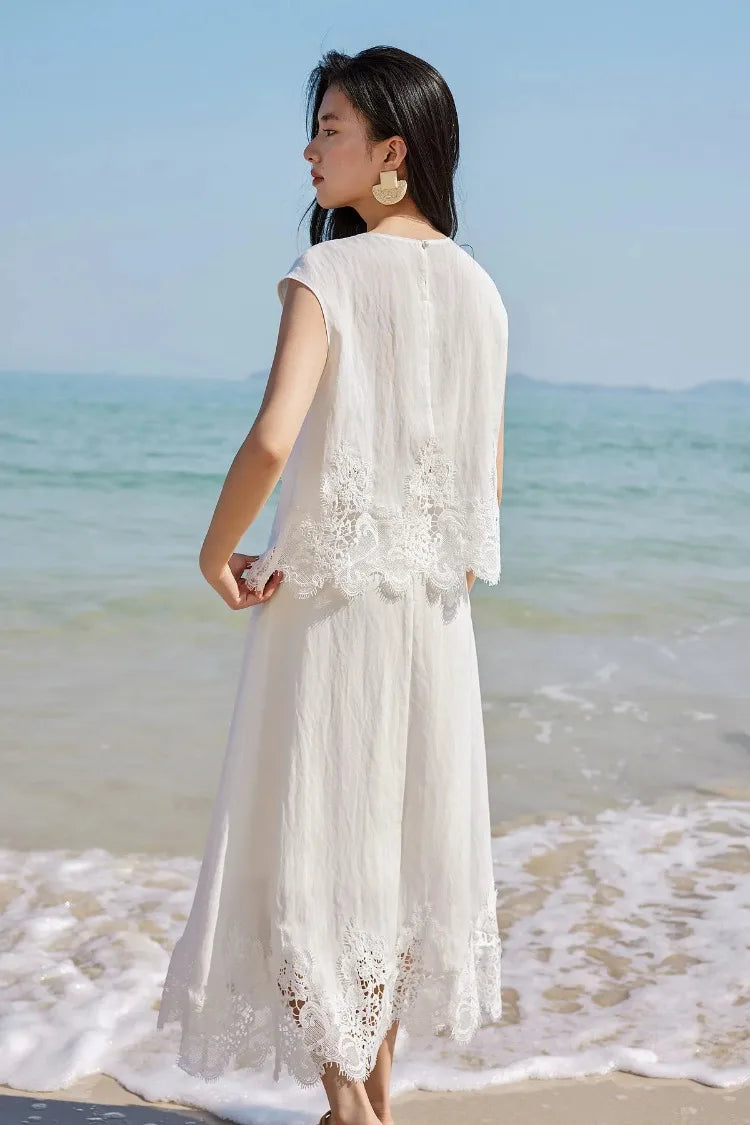 Back view of a woman wearing the Foam Kiss set, showing the pearl button and sleeveless silhouette. — From Borcelleclothes.