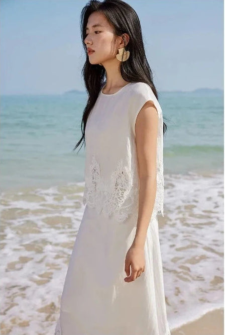 Side view of a woman walking, focusing on the upper part of the Foam Kiss corded lace set. — From Borcelleclothes.