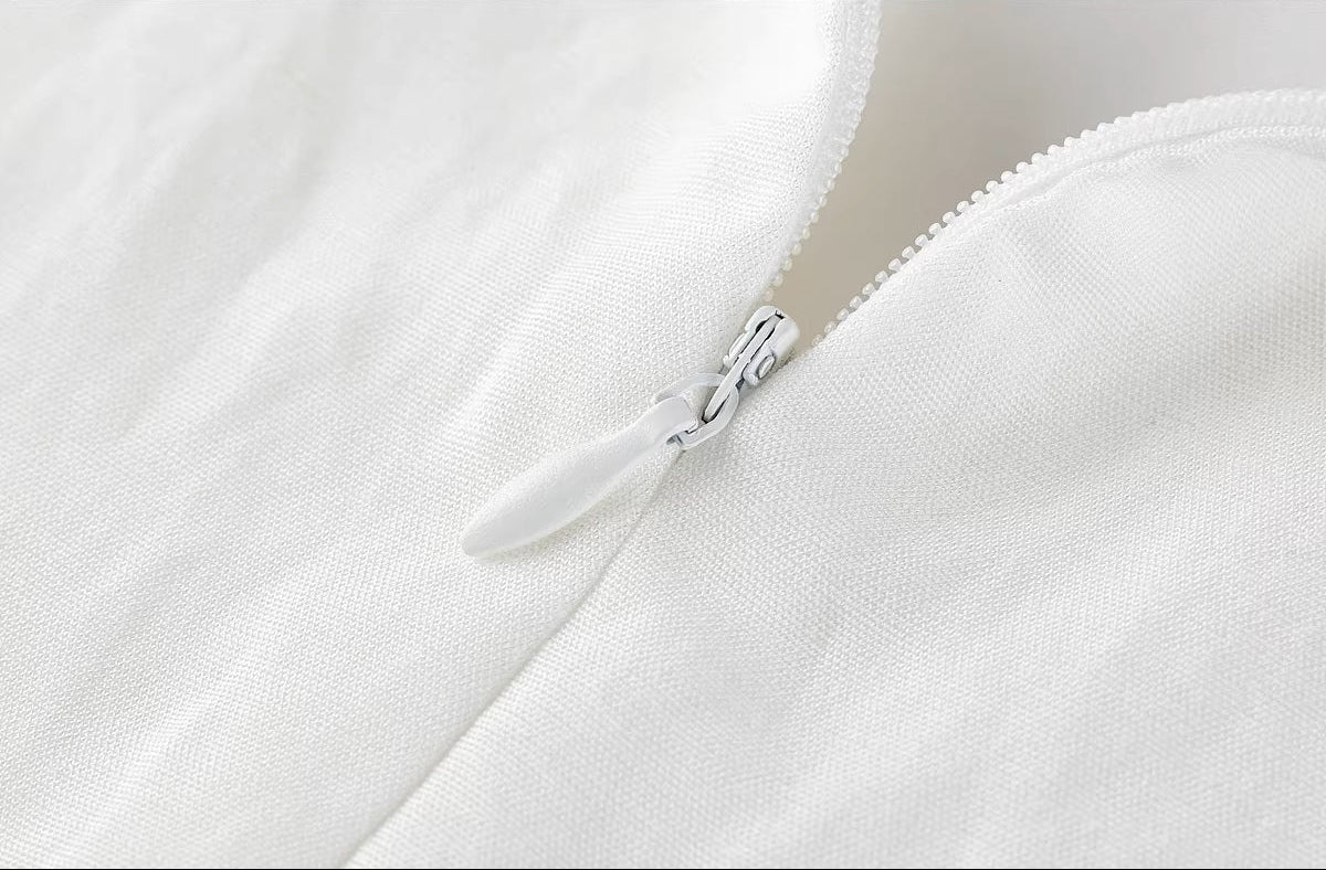 Detail shot of the concealed invisible zipper on the Foam Kiss linen skirt. — From Borcelleclothes.